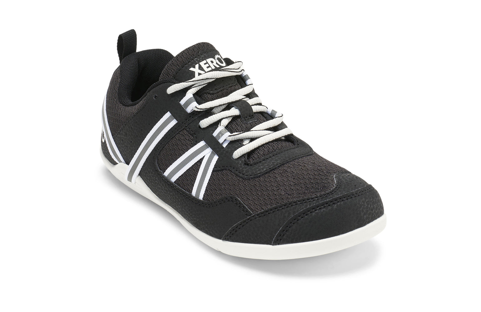 Xero Shoes Canada, specifically women’s barefoot shoes Canada. These minimalist shoes have flexible soles, wide toe boxes, and zero drop. Angled view of Xero Women's Prio  in Black/White. A running and fitness shoe. 