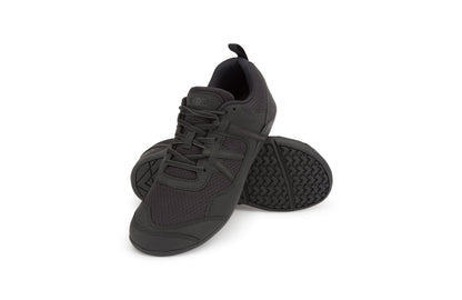 Xero Barefoot Shoes sold in Ontario, Canada. These minimalist shoes have flexible soles, wide toe boxes, and zero drop. Angled side view of Xero Men's Prio  in Black. A running and fitness shoe. 