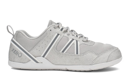 Xero Shoes Canada, specifically women’s barefoot shoes Canada. These minimalist shoes have flexible soles, wide toe boxes, and zero drop. Side view of Xero Women's Prio in Silver Glitter. A running and fitness shoe. 