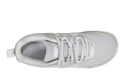Xero Barefoot Shoes for kids sold in Ontario, Canada. These minimalist shoes have flexible soles, wide toe boxes, and zero drop. Top view of Xero Kid's Prio in Silver Glitter. Casual kid's sneaker.