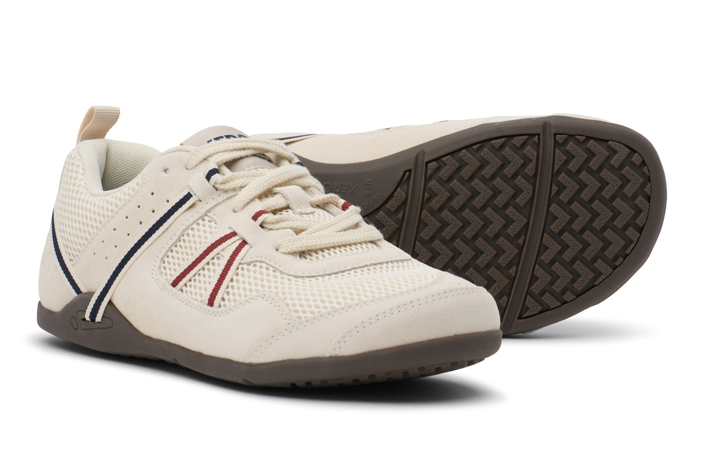 White athletic shoe with brown sole on a white background.  Tru Stride Co brings Xero Shoes to Canada