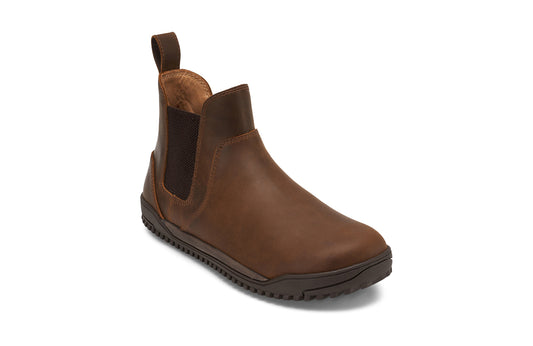 Xero Barefoot Shoes sold in Ontario, Canada. These minimalist shoes have flexible soles, wide toe boxes, and zero drop. Angled view of Women's Ridgeway Chelsea in Brown, a versatile boot.
