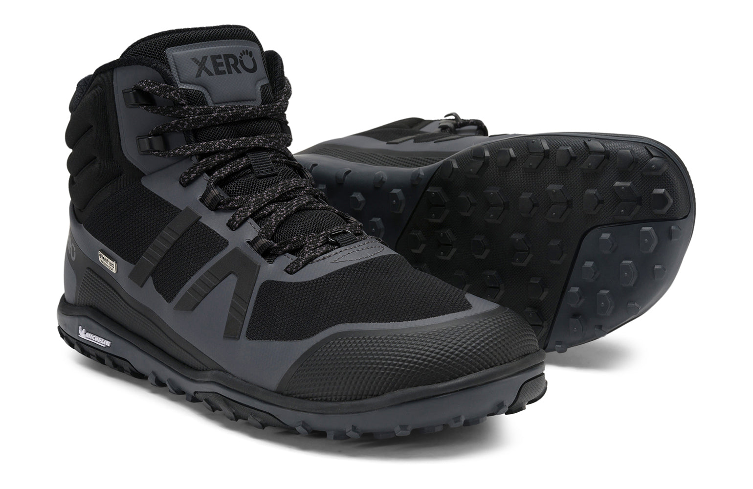 Xero Barefoot Shoes sold in Ontario, Canada. These minimalist shoes have flexible soles, wide toe boxes, and zero drop. Pair view of Xero Men's Scrambler Mid II WP in Black/Asphalt, a lightweight waterproof hiking shoe. 