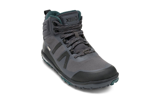 Xero Barefoot Shoes sold in Ontario, Canada. These minimalist shoes have flexible soles, wide toe boxes, and zero drop. Angled view of Xero Women's Scrambler Mid II WP in Asphalt/Sea Moss, a lightweight waterproof hiking shoe. 