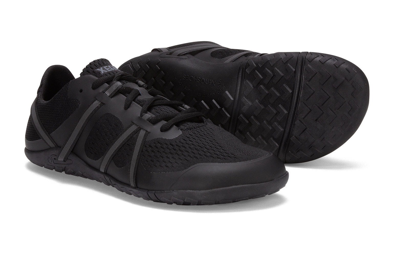 Xero Barefoot Shoes sold in Ontario, Canada. These minimalist shoes have flexible soles, wide toe boxes, and zero drop. Side and sole pair view of Xero Women's Speed Force II in Black. Running and speed training shoe.