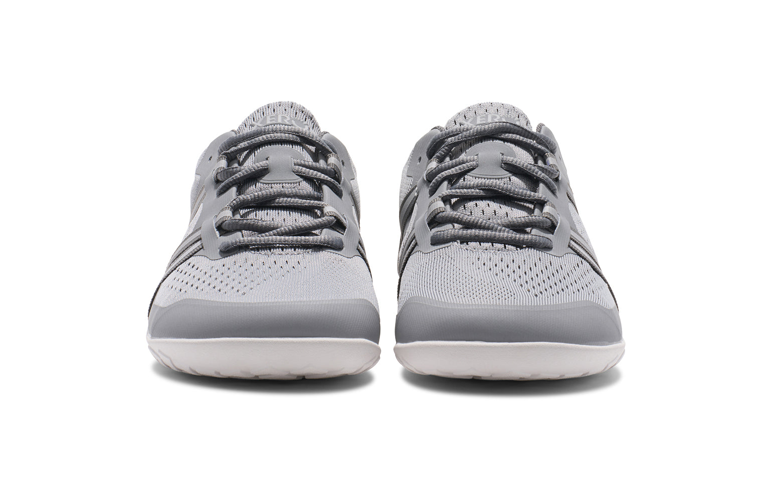 Xero Barefoot Shoes sold in Ontario, Canada. These minimalist shoes have flexible soles, wide toe boxes, and zero drop. Front view of Xero Women's Speed Force II in Alloy Silver. Running and speed training shoe.