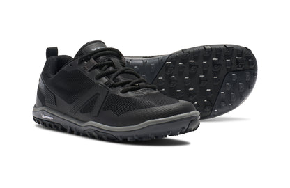 Xero Shoes Canada, specifically barefoot hiking shoes Canada. These minimalist shoes have flexible soles, wide toe boxes, and zero drop. Side and sole view of Xero Women's Scrambler Low EV in Black/Steel Gray, a lightweight high-performance trail runner