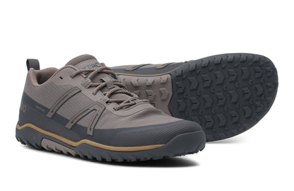 Pair of gray hiking shoes with a textured sole on a white background.  Tru Stride Co brings Xero Shoes to Canada