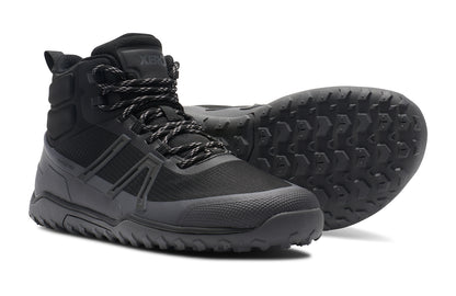 Xero Shoes Canada, specifically barefoot hiking shoes Canada. These minimalist shoes have flexible soles, wide toe boxes, and zero drop. Side and sole view of Xero Men's Scrambler Trail Mid WP in Black/Asphalt - a sturdy hiking boot