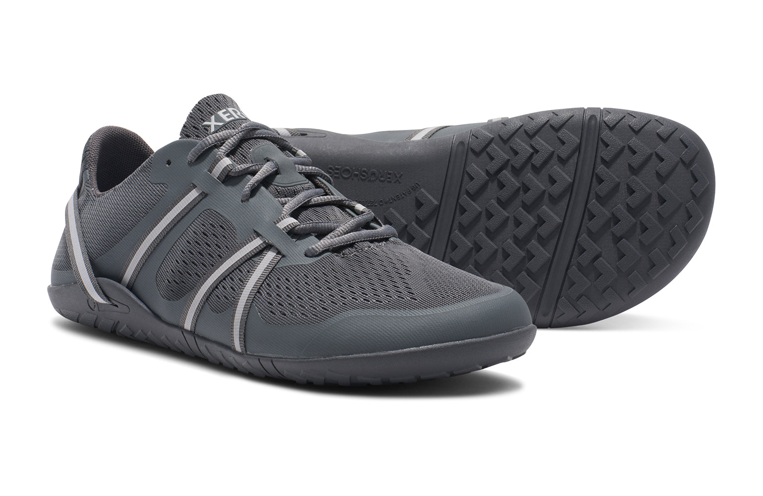 Xero Shoes Canada, specifically barefoot running shoes Canada. These minimalist shoes have flexible soles, wide toe boxes, and zero drop. Side and sole pair view of Xero Men's Speed Force II in Steel Gray/Silver. Running and speed training shoe.
