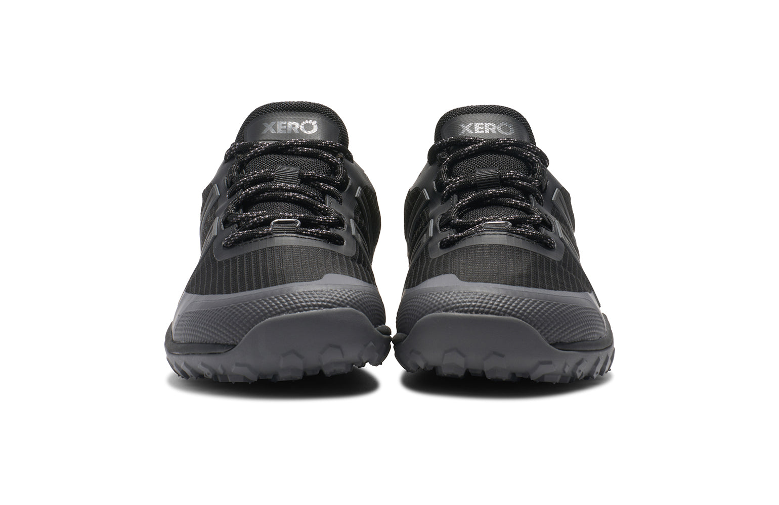 Xero Barefoot Shoes sold in Ontario, Canada. These minimalist shoes have flexible soles, wide toe boxes, and zero drop. Front view of Xero Women's Scrambler Trail Low WP in Black/Asphalt - a sturdy hiking shoe