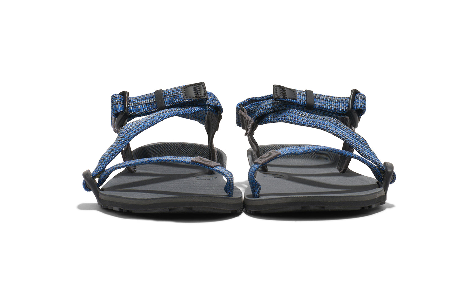 Xero Kid's Barefoot Shoes sold in Ontario, Canada. These minimalist shoes have flexible soles, wide toe boxes, and zero drop. Front view of Xero Kid's Z-Trail in Blue, a lightweight packable sport sandal. 