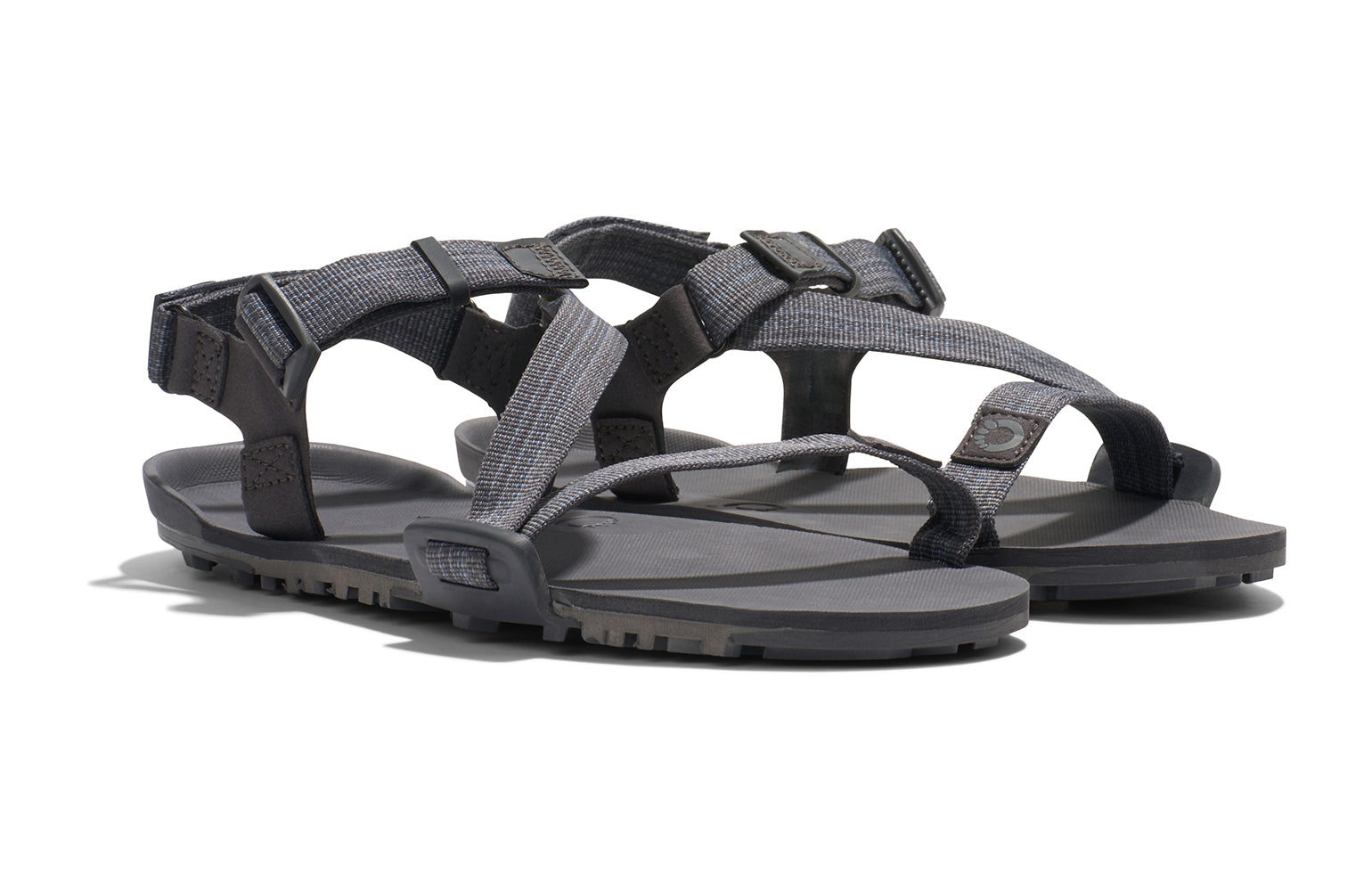 Xero Barefoot Shoes sold in Ontario, Canada. These minimalist shoes have flexible soles, wide toe boxes, and zero drop. Angled view of Xero Men's Z-Trail EV in Steel Gray/Asphalt. Trail hiking, running, and recovery sandal. 