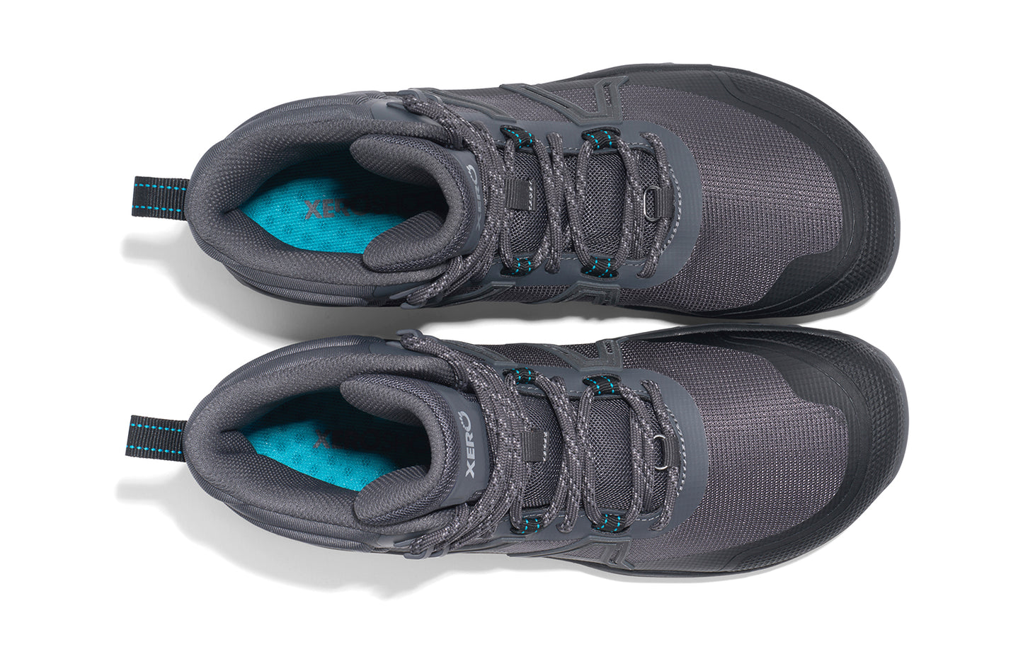 Xero Barefoot Shoes sold in Ontario, Canada. These minimalist shoes have flexible soles, wide toe boxes, and zero drop. Top view of Xero Women's Scambler Trail Mid in Asphalt/Black, a lightweight hiking boot