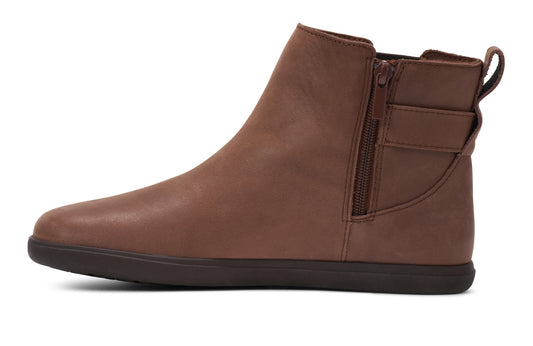 Xero Shoes Canada, specifically women’s barefoot shoes Canada. These minimalist shoes have flexible soles, wide toe boxes, and zero drop. Left Side view of Xero's Tari II in Cappuccino, a stylish leather boot