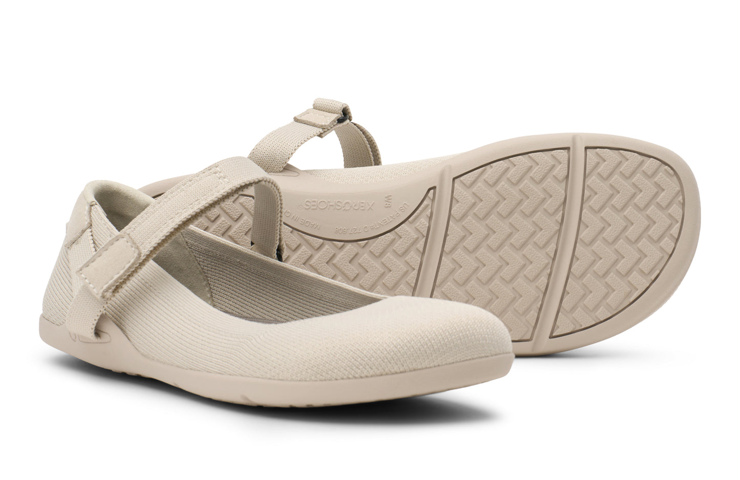 Beige Mary Jane shoes with a strap on a white background. Tru Stride Co brings Xero Shoes to Canada