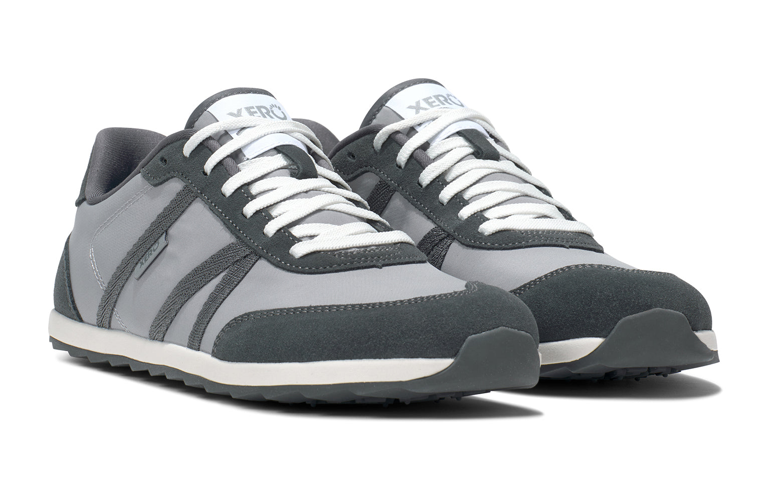Xero Barefoot Shoes sold in Ontario, Canada. These minimalist shoes have flexible soles, wide toe boxes, and zero drop. Angle view of Xero Men's Wynn in Alloy/Steel Gray, a casual sneaker