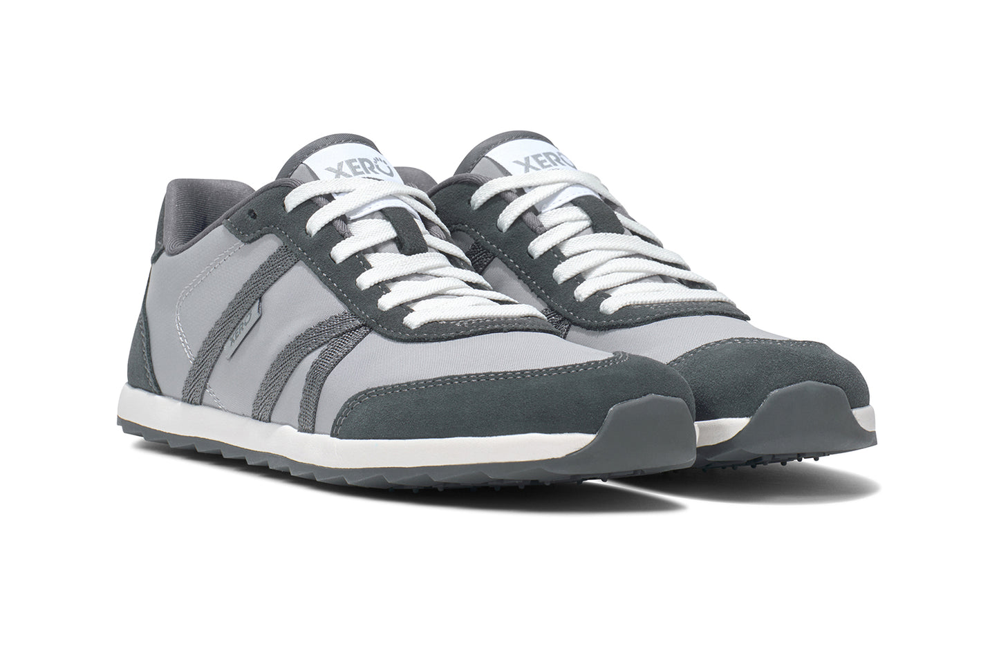 Xero Barefoot Shoes sold in Ontario, Canada. These minimalist shoes have flexible soles, wide toe boxes, and zero drop. Side view of Xero's Wynn in Alloy/Steel Gray, a casual sneaker