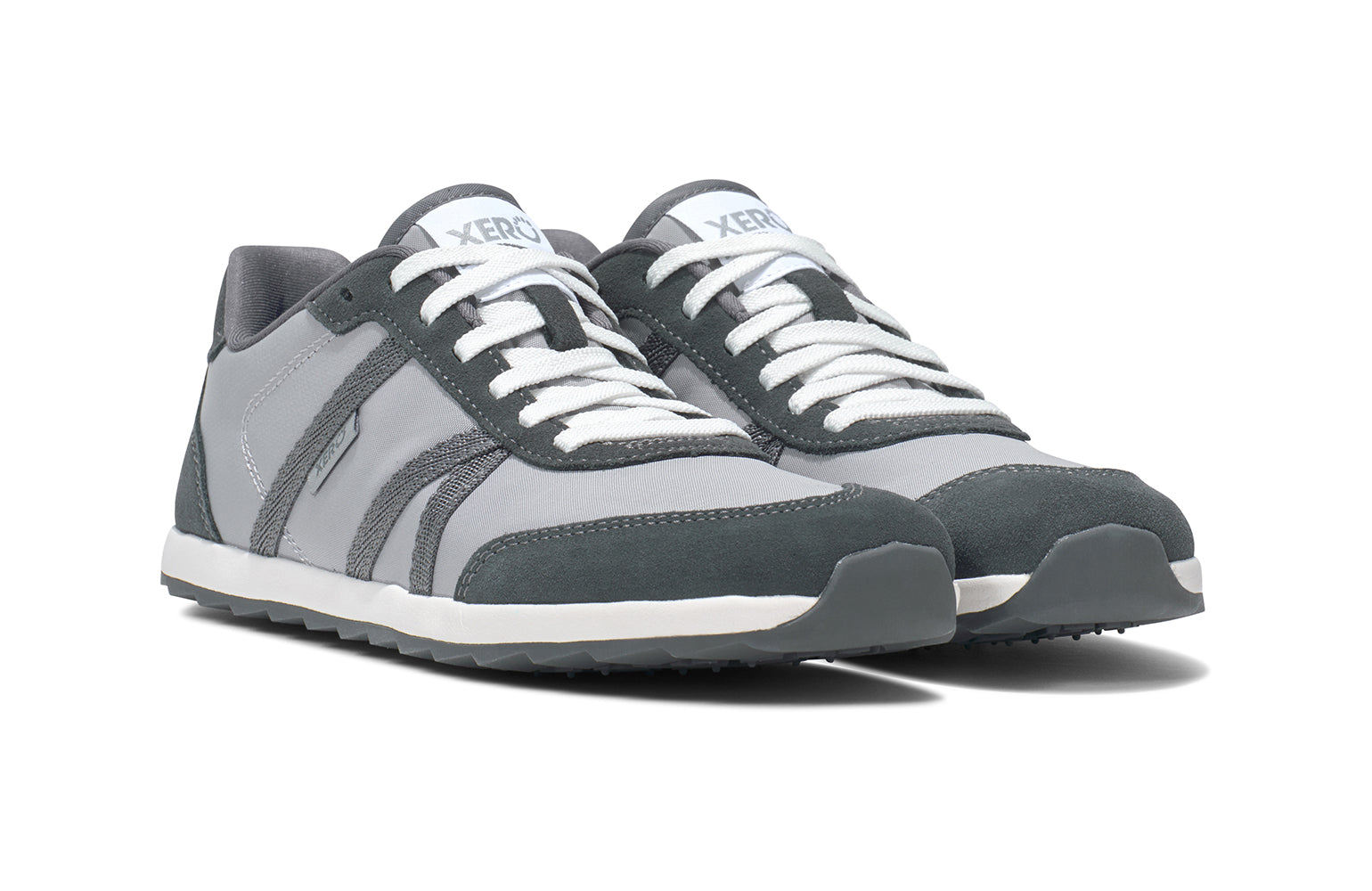 Xero Barefoot Shoes sold in Ontario, Canada. These minimalist shoes have flexible soles, wide toe boxes, and zero drop. Side view of Xero's Wynn in Alloy/Steel Gray, a casual sneaker