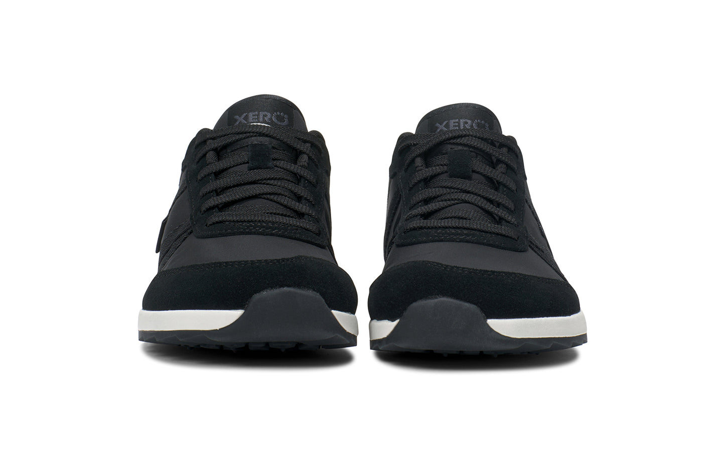 Xero Barefoot Shoes sold in Ontario, Canada. These minimalist shoes have flexible soles, wide toe boxes, and zero drop. Front view of Xero's Wynn in Black/White, a casual sneaker