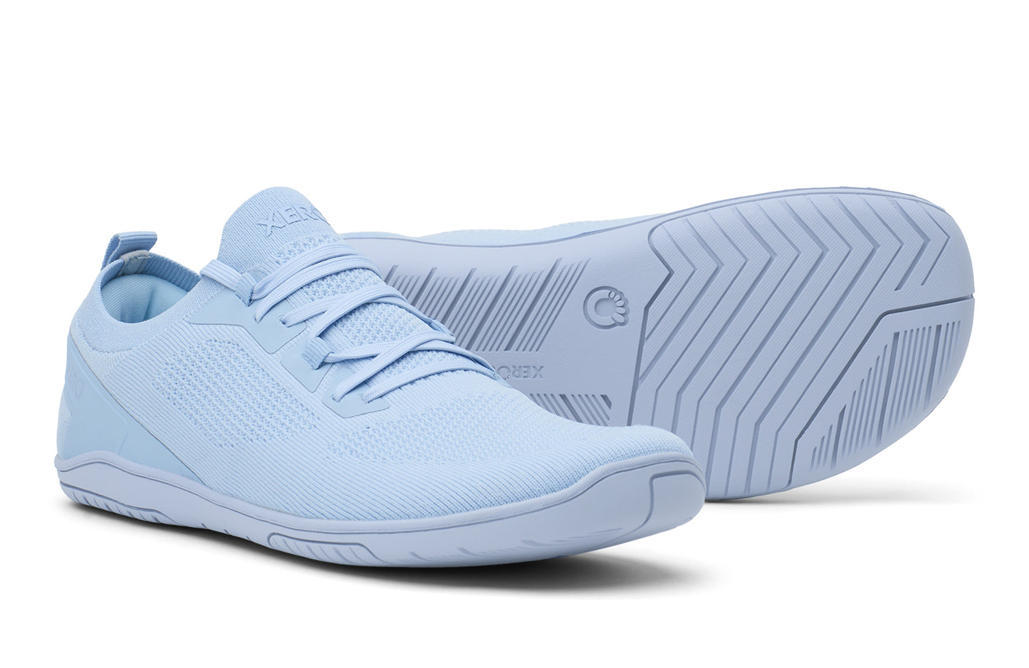 Light blue athletic shoes on a white background.  Tru Stride Co brings Xero Shoes to Canada