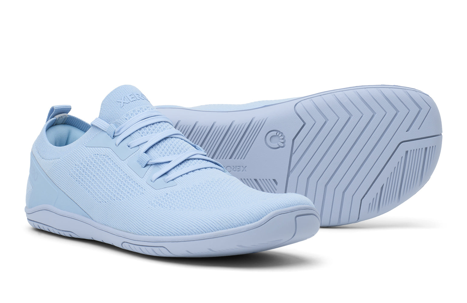 Light blue athletic shoes on a white background.  Tru Stride Co brings Xero Shoes to Canada