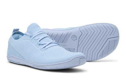 Light blue athletic shoes on a white background.  Tru Stride Co brings Xero Shoes to Canada