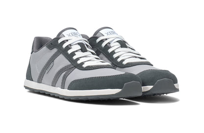 Xero Shoes Canada, specifically women’s barefoot shoes Canada. These minimalist shoes have flexible soles, wide toe boxes, and zero drop. Side view of Xero's Wynn in Alloy/Steel Gray, a casual sneaker