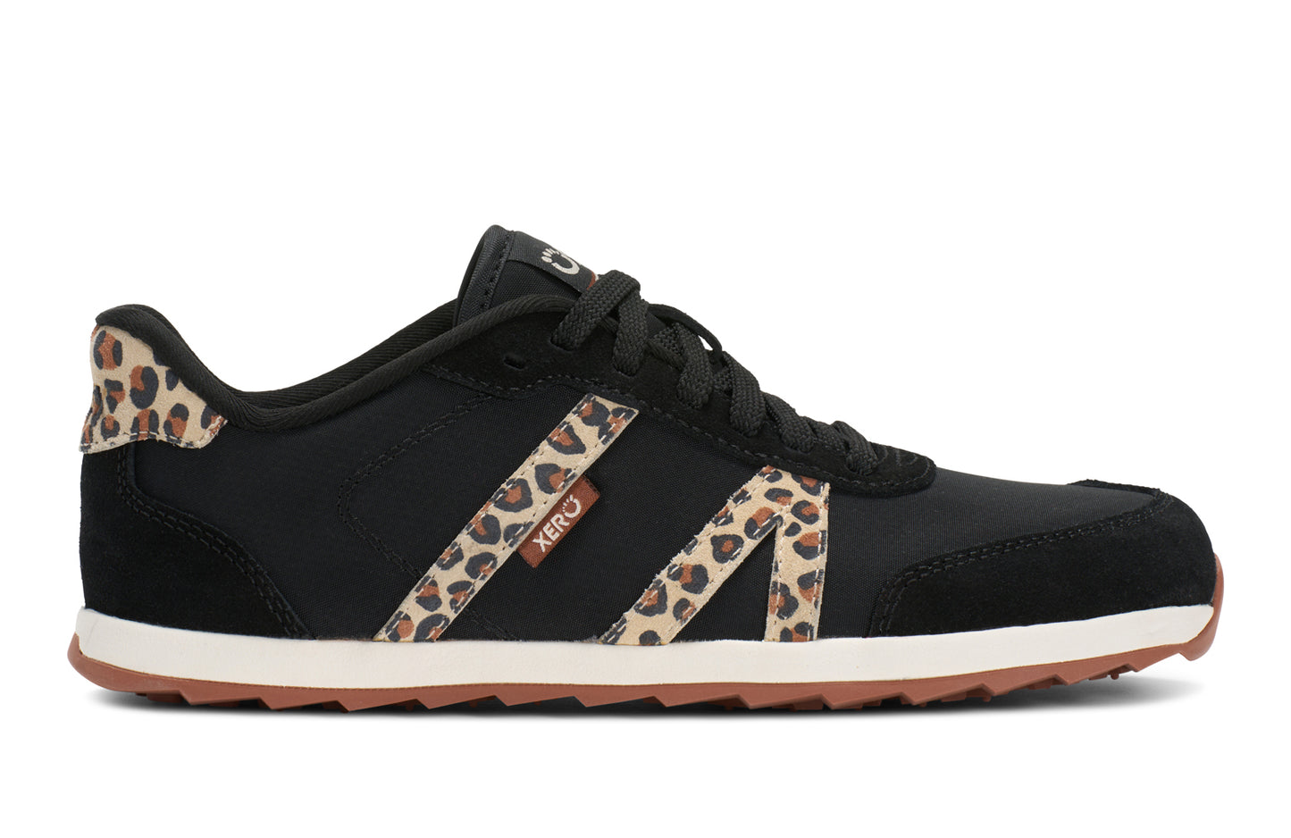 Xero Shoes Canada, specifically women’s barefoot shoes Canada. These minimalist shoes have flexible soles, wide toe boxes, and zero drop. Side view of Xero's Wynn in Black/Leopard, a casual sneaker