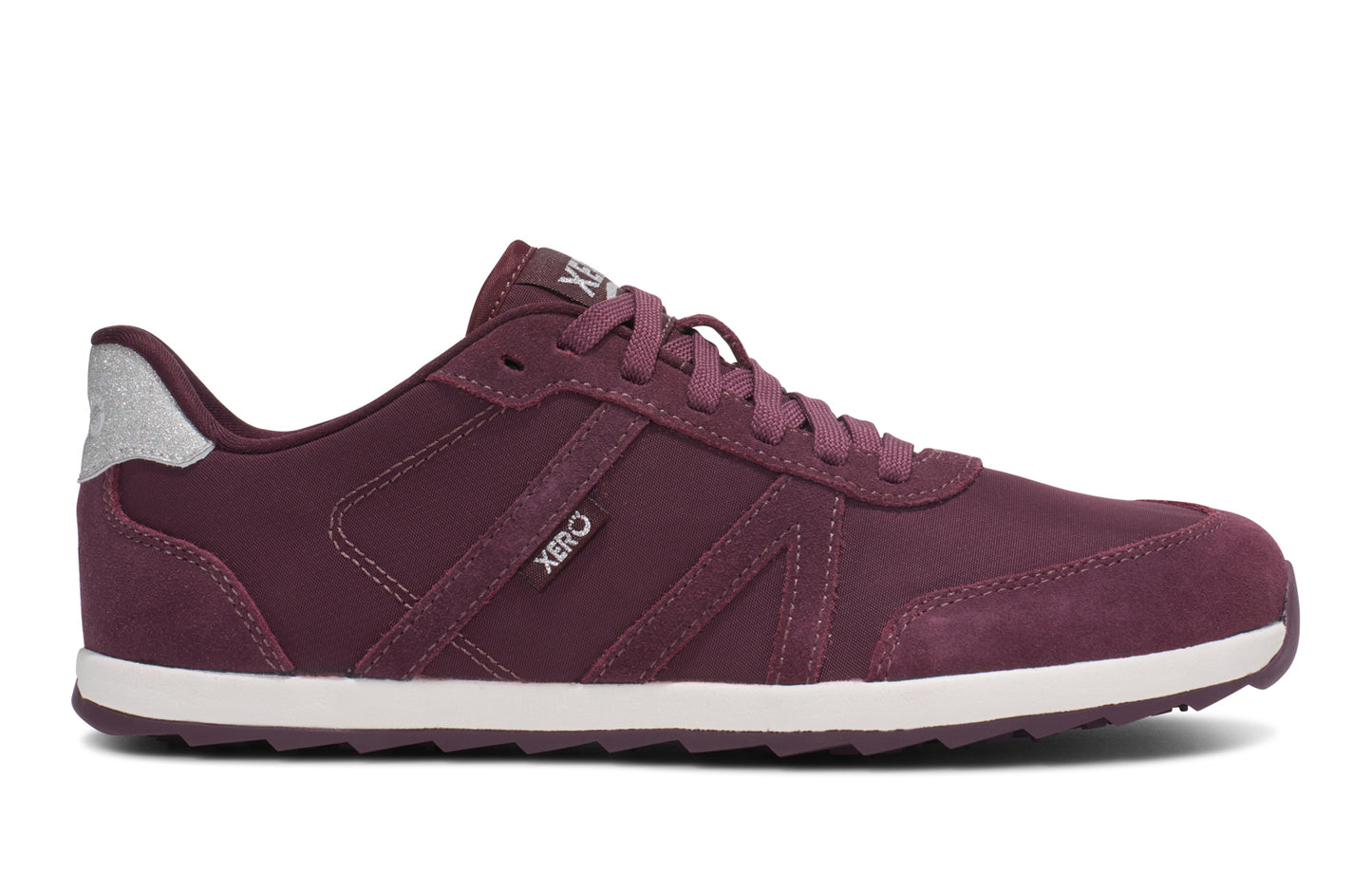 Xero Shoes Canada, specifically women’s barefoot shoes Canada. These minimalist shoes have flexible soles, wide toe boxes, and zero drop. Side view of Xero's Wynn in Fig Glitter, a casual sneaker