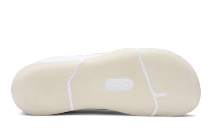 White basketball shoe sole with a visible brand logo on a white. Tru Stride Co brings Xero Shoes to Canadabackground