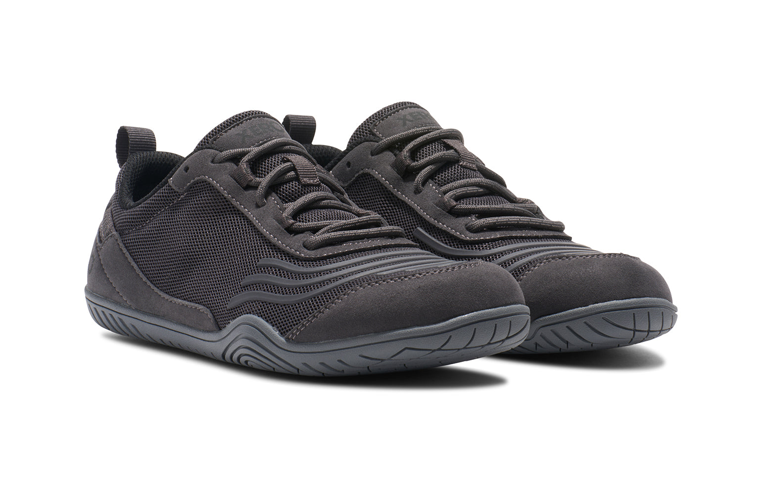 Xero Shoes Canada, specifically barefoot running shoes Canada. These minimalist shoes have flexible soles, wide toe boxes, and zero drop. Angled view of Xero Women's 360s in Asphalt/Gray. A cross-training shoe. 