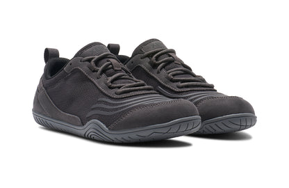 Xero Shoes Canada, specifically barefoot running shoes Canada. These minimalist shoes have flexible soles, wide toe boxes, and zero drop. Angled view of Xero Women's 360s in Asphalt/Gray. A cross-training shoe. 