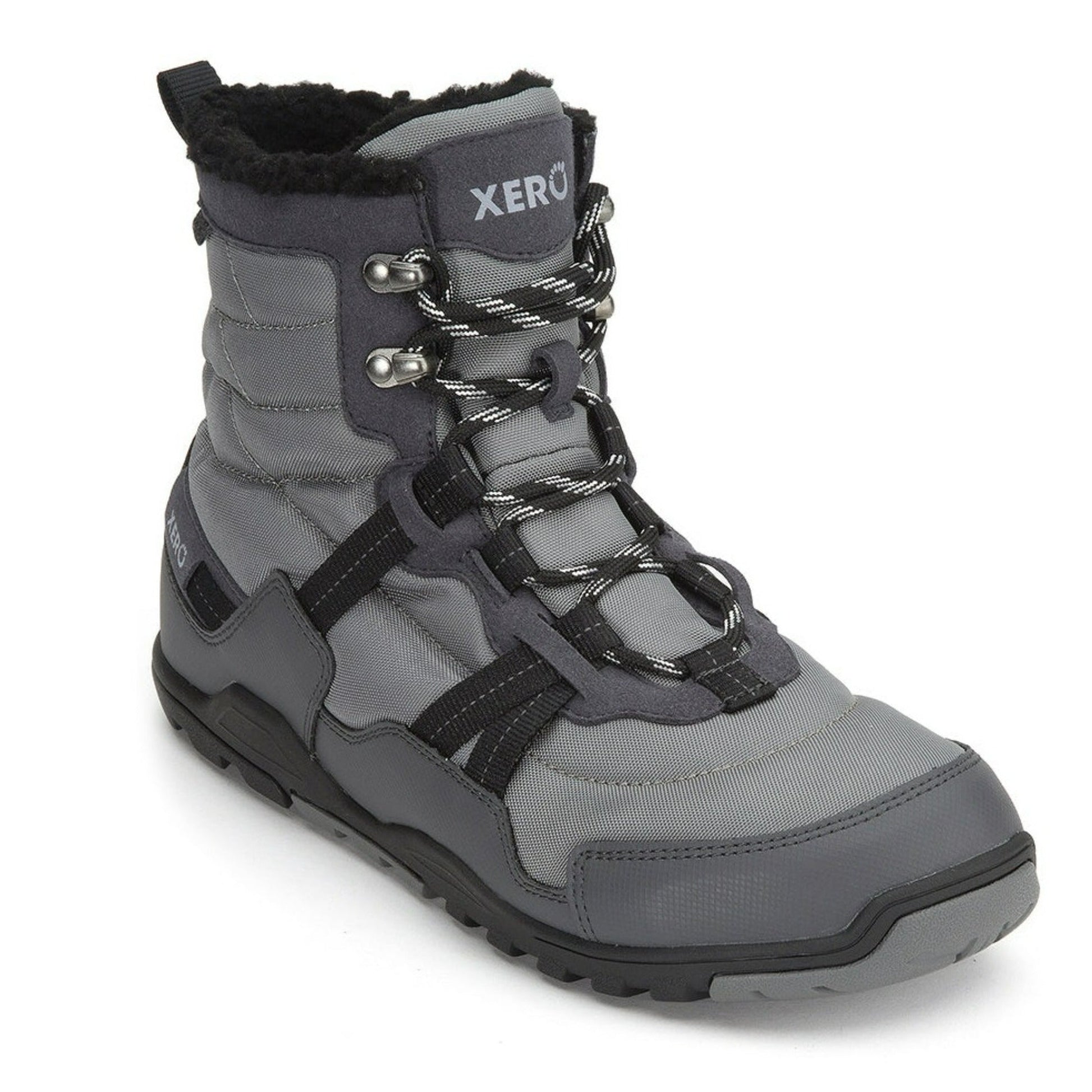 Xero Shoes Canada, specifically men’s barefoot shoes Canada. These minimalist shoes have flexible soles, wide toe boxes, and zero drop. Angled view of Xero Men's Alpine in Asphalt/Black. Waterproof, lightweight snow boot. 