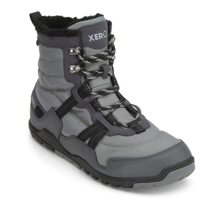 Xero Shoes Canada, specifically men’s barefoot shoes Canada. These minimalist shoes have flexible soles, wide toe boxes, and zero drop. Angled view of Xero Men's Alpine in Asphalt/Black. Waterproof, lightweight snow boot. 