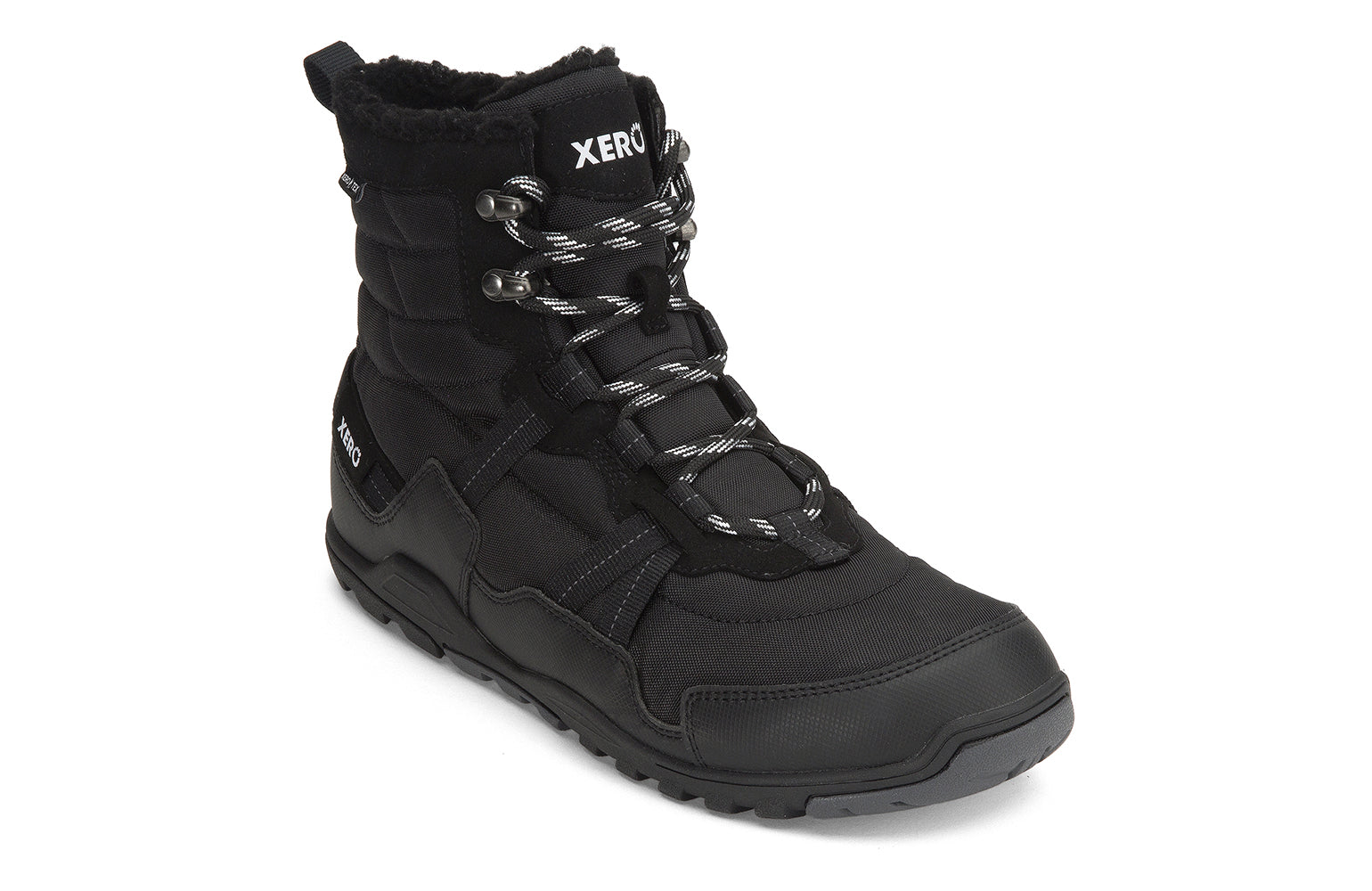 Xero Shoes Canada, specifically men’s barefoot shoes Canada. These minimalist shoes have flexible soles, wide toe boxes, and zero drop. Angled view of Xero Men's Alpine in Black. Waterproof, lightweight snow boot. 