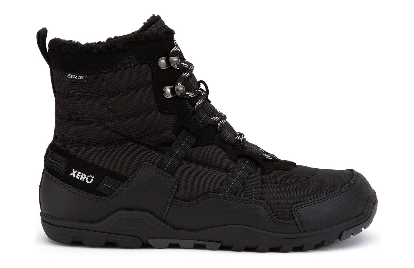 Xero Shoes Canada, specifically men’s barefoot shoes Canada. These minimalist shoes have flexible soles, wide toe boxes, and zero drop. Lateral side view of Xero Men's Alpine in Black. Waterproof, lightweight snow boot. 