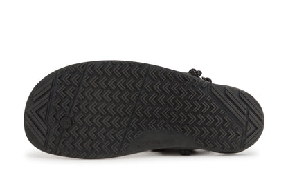 Xero Shoes Canada, specifically men’s barefoot shoes Canada. These minimalist shoes have flexible soles, wide toe boxes, and zero drop. Sole view of Xero Men's Aqua Cloud in Black. Versatile water sport and hiking sandal. 