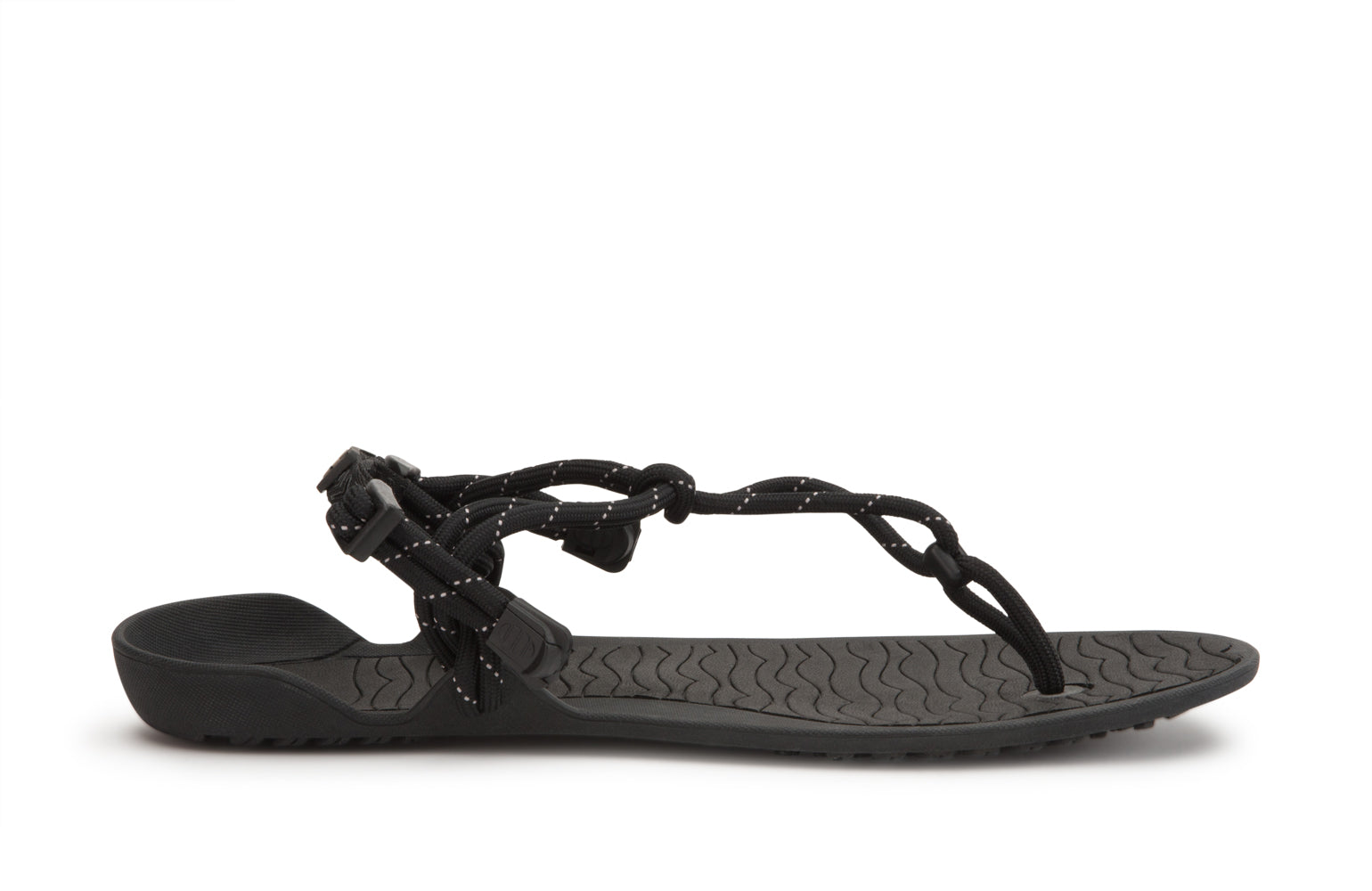 Xero Shoes Canada, specifically men’s barefoot shoes Canada. These minimalist shoes have flexible soles, wide toe boxes, and zero drop. Lateral side view of Xero Men's Aqua Cloud in Black. Versatile water sport and hiking sandal. 