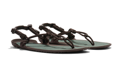 Xero Shoes Canada, specifically men’s barefoot shoes Canada. These minimalist shoes have flexible soles, wide toe boxes, and zero drop. Angled view of Xero Men's Aqua Cloud in Java Brown/Dark Forest. Versatile water sport and hiking sandal. 