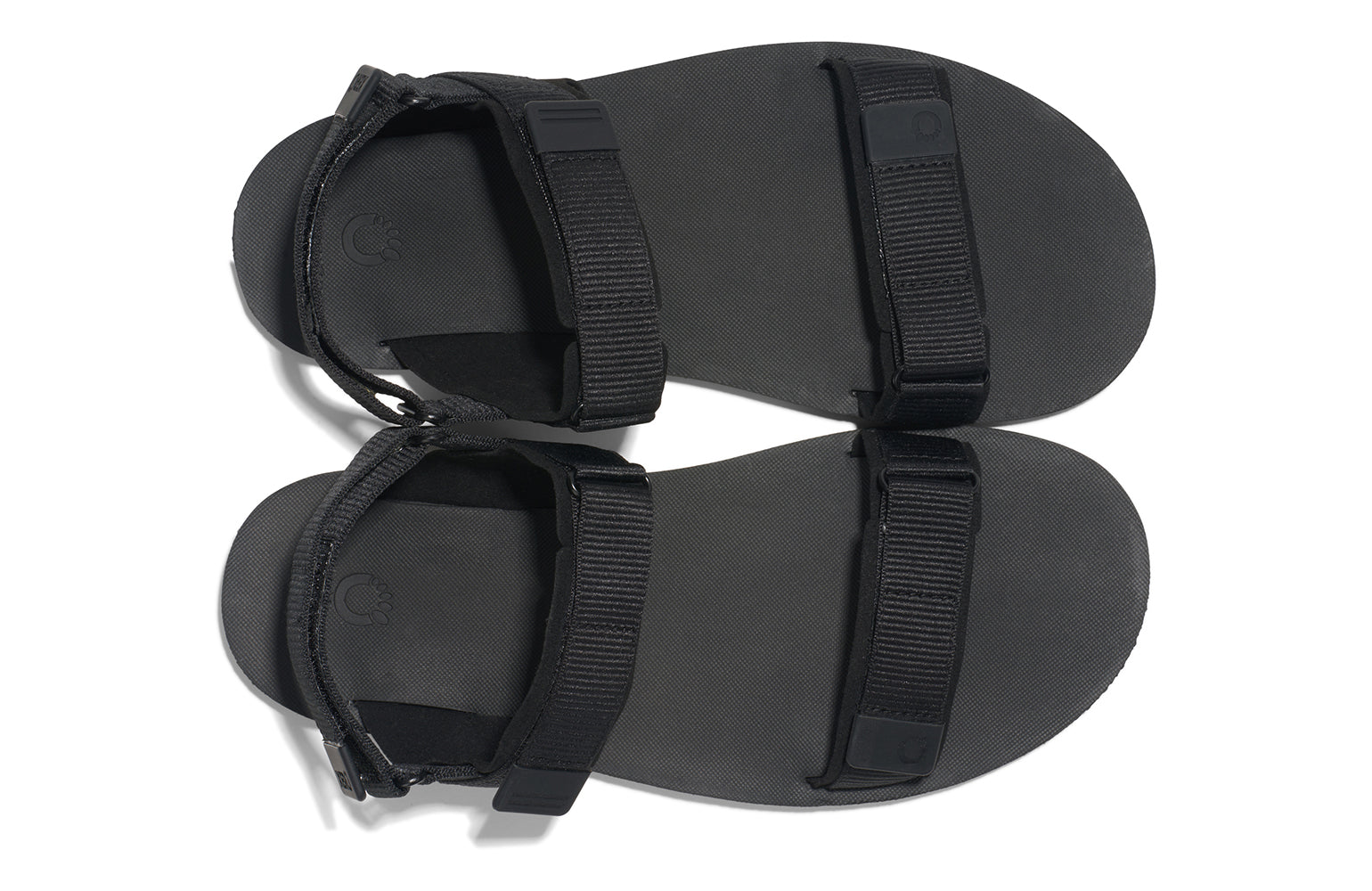 Xero Shoes Canada, specifically men’s barefoot shoes Canada. These minimalist shoes have flexible soles, wide toe boxes, and zero drop. Top view of Xero Men's D-Trail in Black/Asphalt, a versatile hiking sandal.