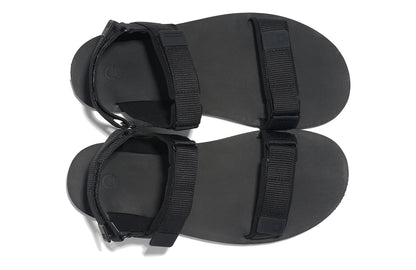 Xero Shoes Canada, specifically men’s barefoot shoes Canada. These minimalist shoes have flexible soles, wide toe boxes, and zero drop. Top view of Xero Men's D-Trail in Black/Asphalt, a versatile hiking sandal.