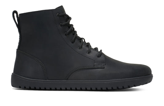 Xero Shoes Canada, specifically men’s barefoot shoes Canada. These minimalist shoes have flexible soles, wide toe boxes, and zero drop. Side view of Xero Men's Denver II in Black. Classic leather boot.