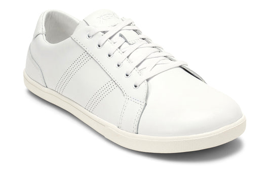 Xero Shoes Canada, specifically men’s barefoot shoes Canada. These minimalist shoes have flexible soles, wide toe boxes, and zero drop. Angled view of Men's Dillon Leather in White. A classic leather sneaker. 
