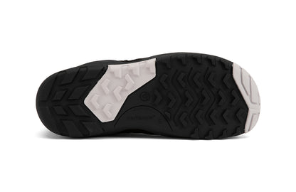 Xero Shoes Canada, specifically women’s barefoot shoes Canada. These minimalist shoes have flexible soles, wide toe boxes, and zero drop. Sole view of Xero Women's Alpine in Black. Waterproof, lightweight snow boot. 