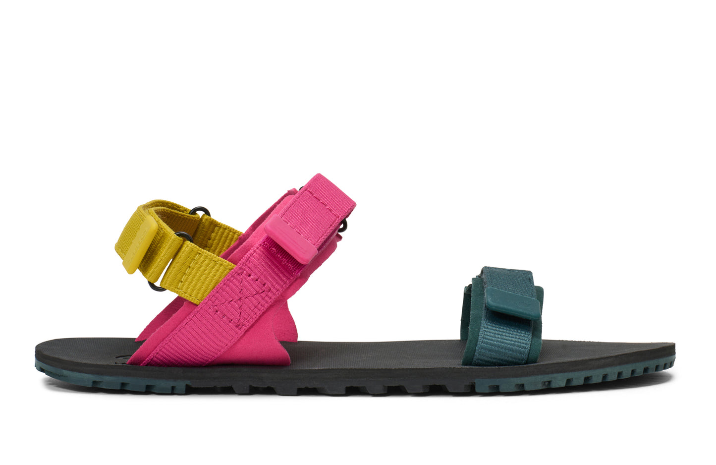 Xero Shoes Canada, specifically women’s barefoot shoes Canada. These minimalist shoes have flexible soles, wide toe boxes, and zero drop. Side view of Xero Women's D-Trail in Fuchsia Purple/Sea Moss, a versatile hiking sandal.