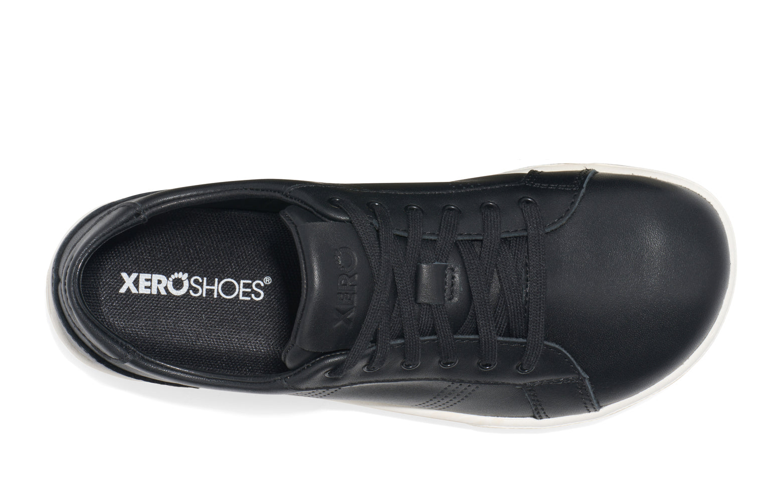Xero Shoes Canada, specifically women’s barefoot shoes Canada. These minimalist shoes have flexible soles, wide toe boxes, and zero drop. Top view of Women's Dillon Leather in Black. A classic leather sneaker. 