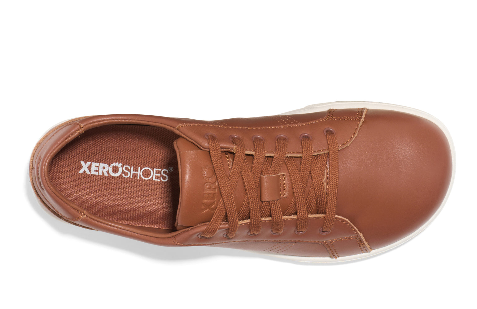Xero Shoes Canada, specifically women’s barefoot shoes Canada. These minimalist shoes have flexible soles, wide toe boxes, and zero drop. Top view of Women's Dillon Leather in Mocha Bisque. A classic leather sneaker. 