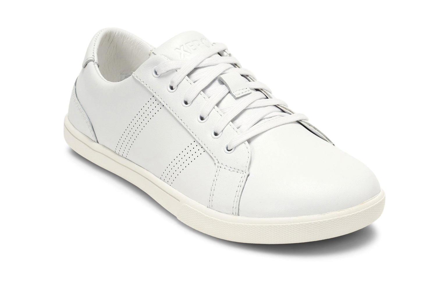 Xero Shoes Canada, specifically women’s barefoot shoes Canada. These minimalist shoes have flexible soles, wide toe boxes, and zero drop. Angled view of Women's Dillon Leather in White. A classic leather sneaker. 