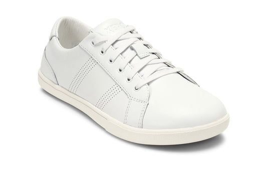 Xero Shoes Canada, specifically women’s barefoot shoes Canada. These minimalist shoes have flexible soles, wide toe boxes, and zero drop. Angled view of Women's Dillon Leather in White. A classic leather sneaker. 